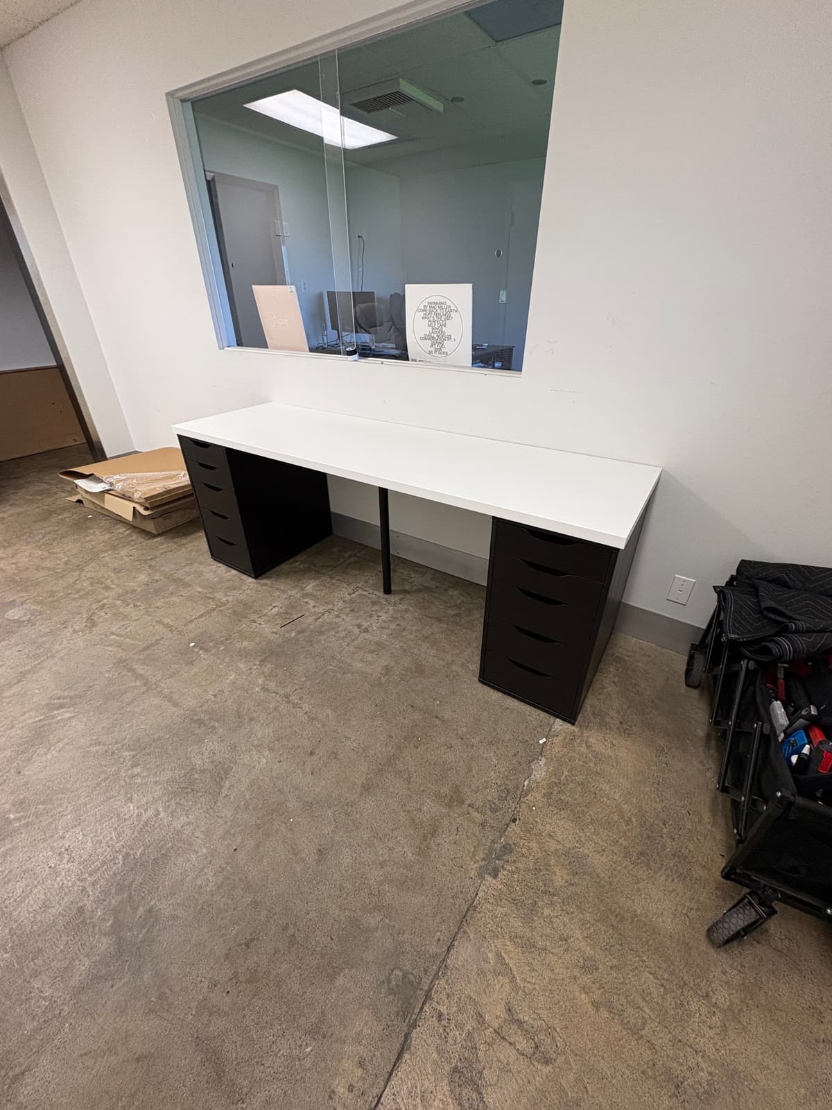 IKEA Black Office Desk Assembly with White Laminate Top