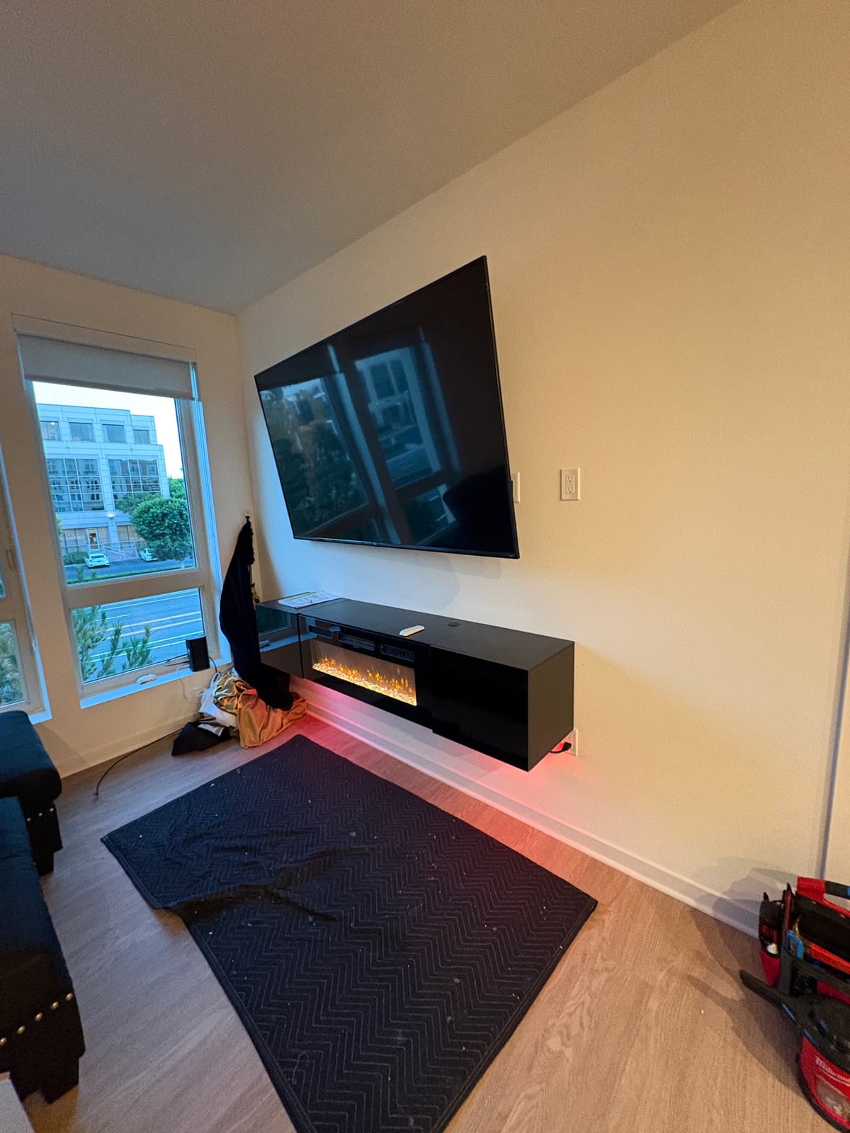 Wall-Mounted Black Media Console Installation